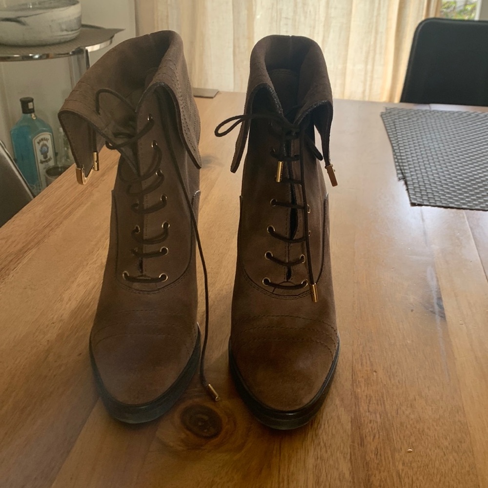 These Louis Vuitton boots are in mint condition!  Only worn once!